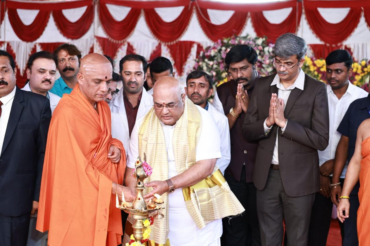 Ceremonial lamp lighting with the Swamiji and invited guests at an inauguration