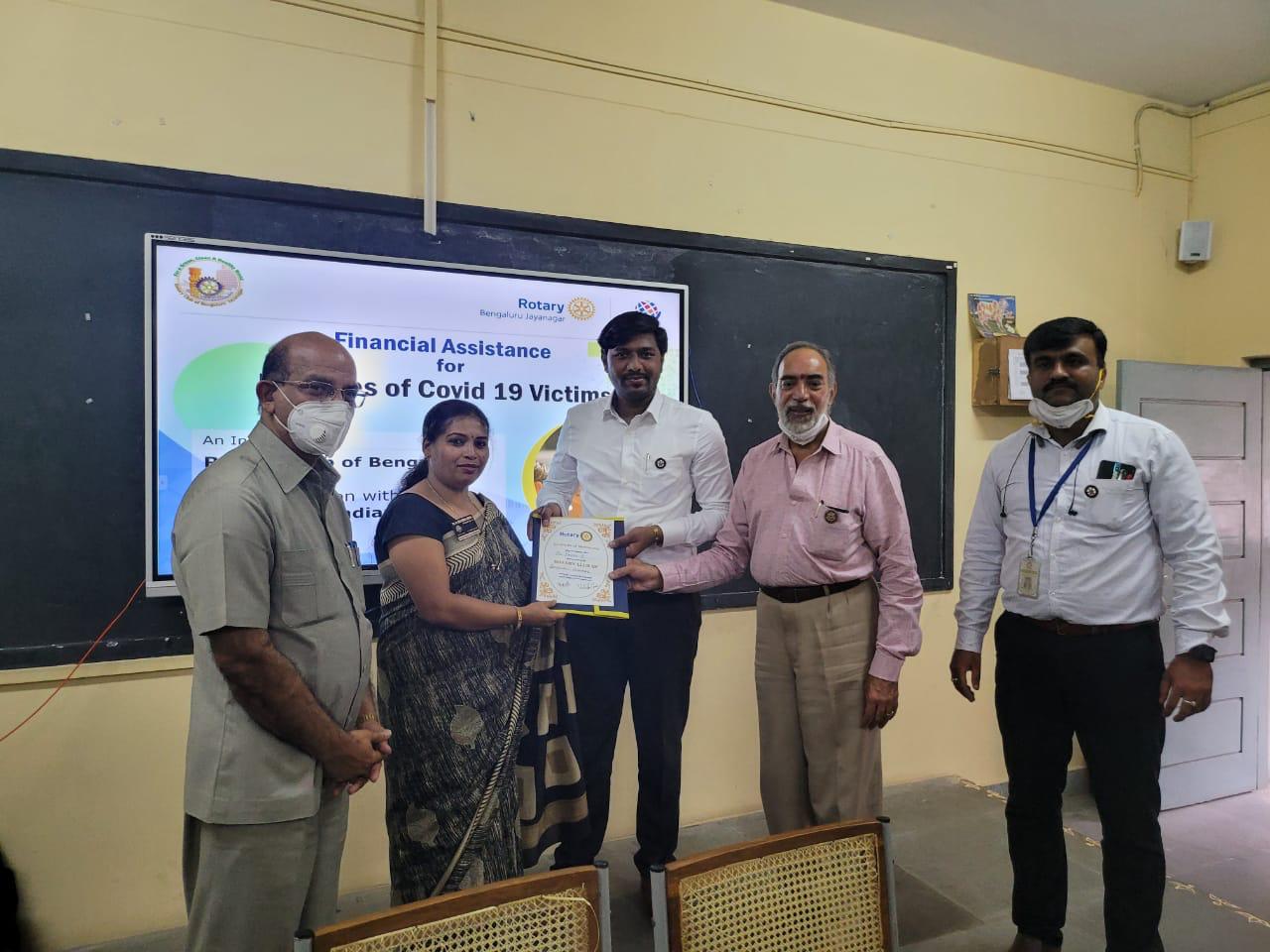 Handing over financial assistance certificates to families of Covid-19 victims with Rotary Bengaluru Jayanagar