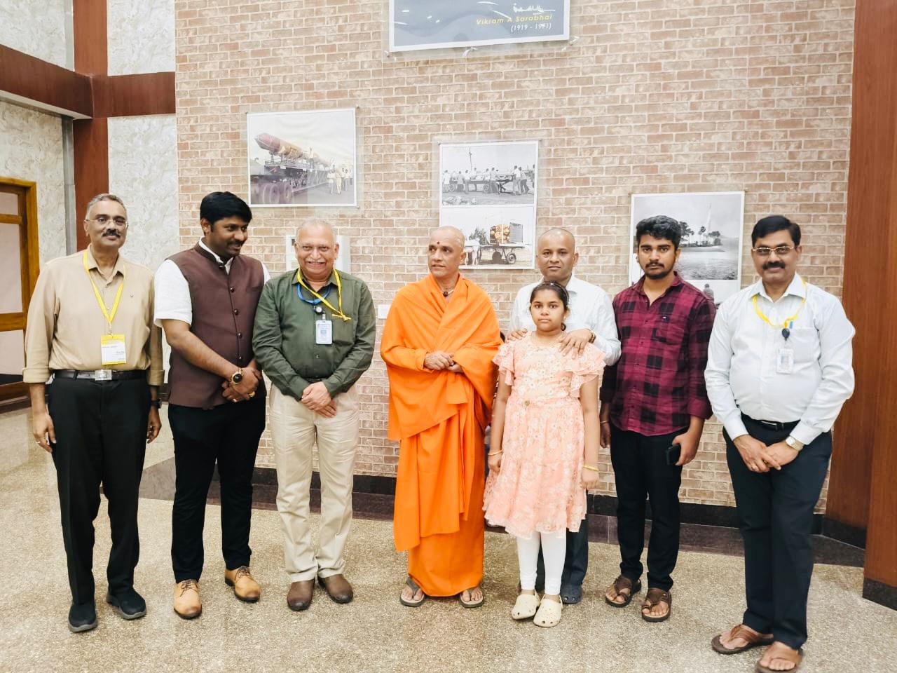 Group photograph at a research institute with the Swamiji